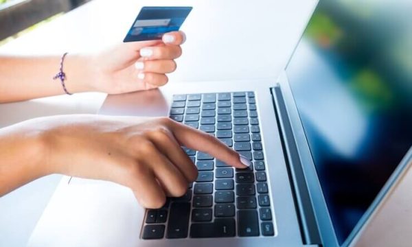 female-hands-keyboard-holding-credit-card-shopping-ecommerce-website_520003-39 female-hands-keyboard-holding-credit-card-shopping-ecommerce-website_520003-39